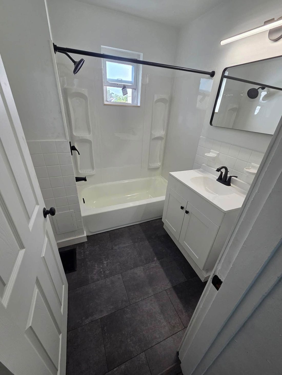 Bathroom remodel with matte black fixtures