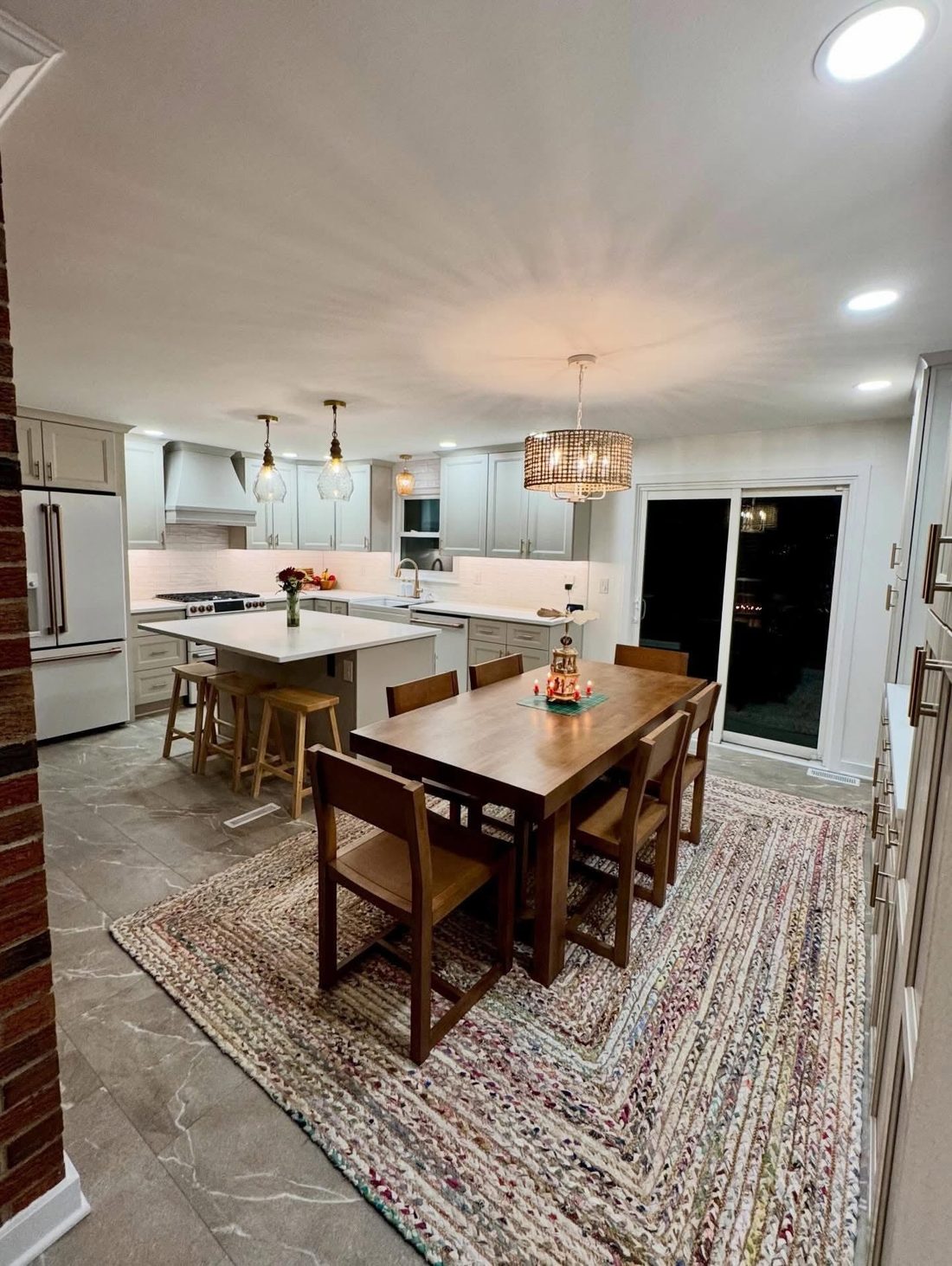 Kitchen and dining remodel with brick accent wall