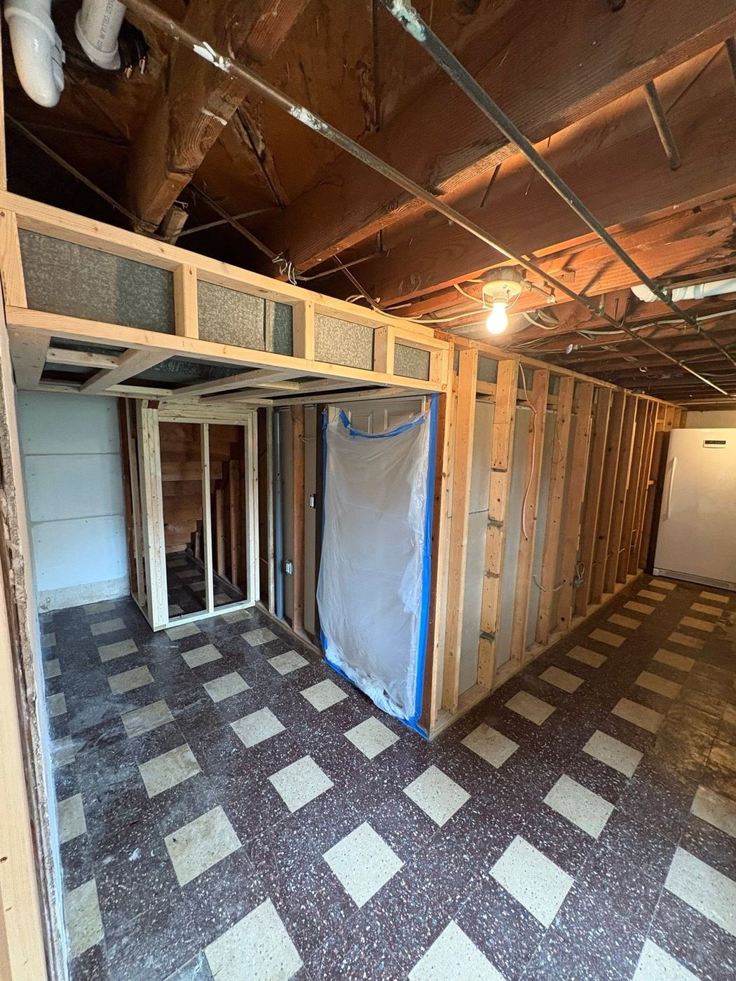 Basement framing in progress