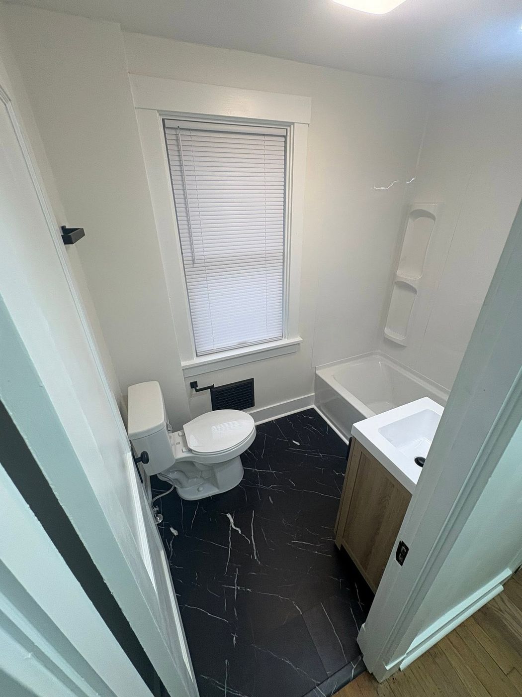 Remodeled bathroom with new vanity
